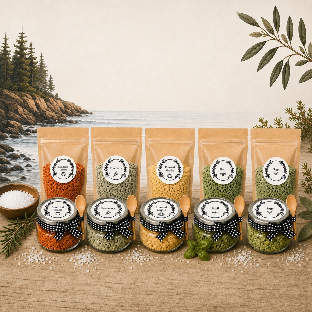 Seasoned Shore herb infused sea salts — Sundried Tomato, Rosemary, Roasted Garlic, Basil and Sage, in gift jars and refill pouches on a Nova Scotia shore